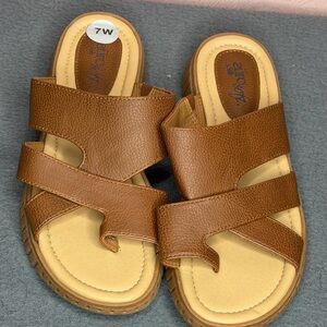 Size 7 sandals never worn.